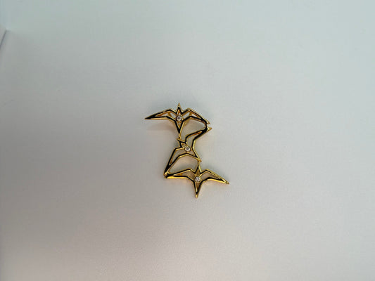 Gold open star diamond earrings in a white presentation box, the kind of piece people bring to Jewel Box Hawaii in Honolulu for an appraisal