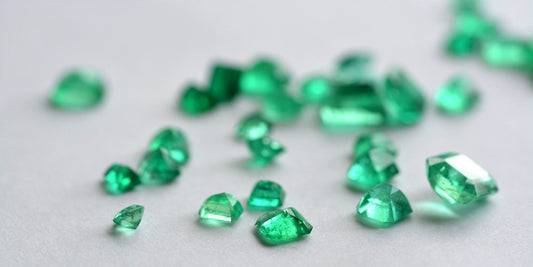 Faceted emerald gemstone — May’s birthstone — showing the characteristic deep green color