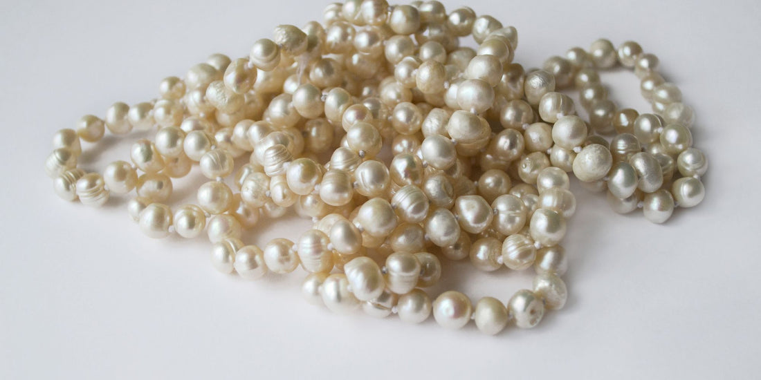 Strands of lustrous white freshwater pearls — June's birthstone