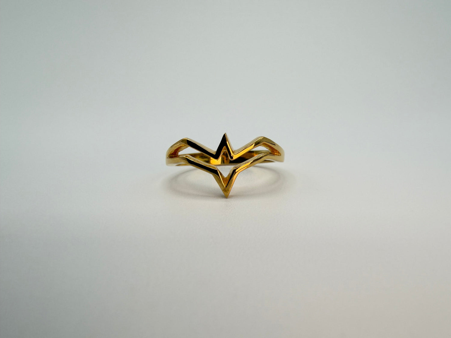 Gold lightning bolt crown ring, handcrafted by Jewel Box Hawaii, Honolulu.